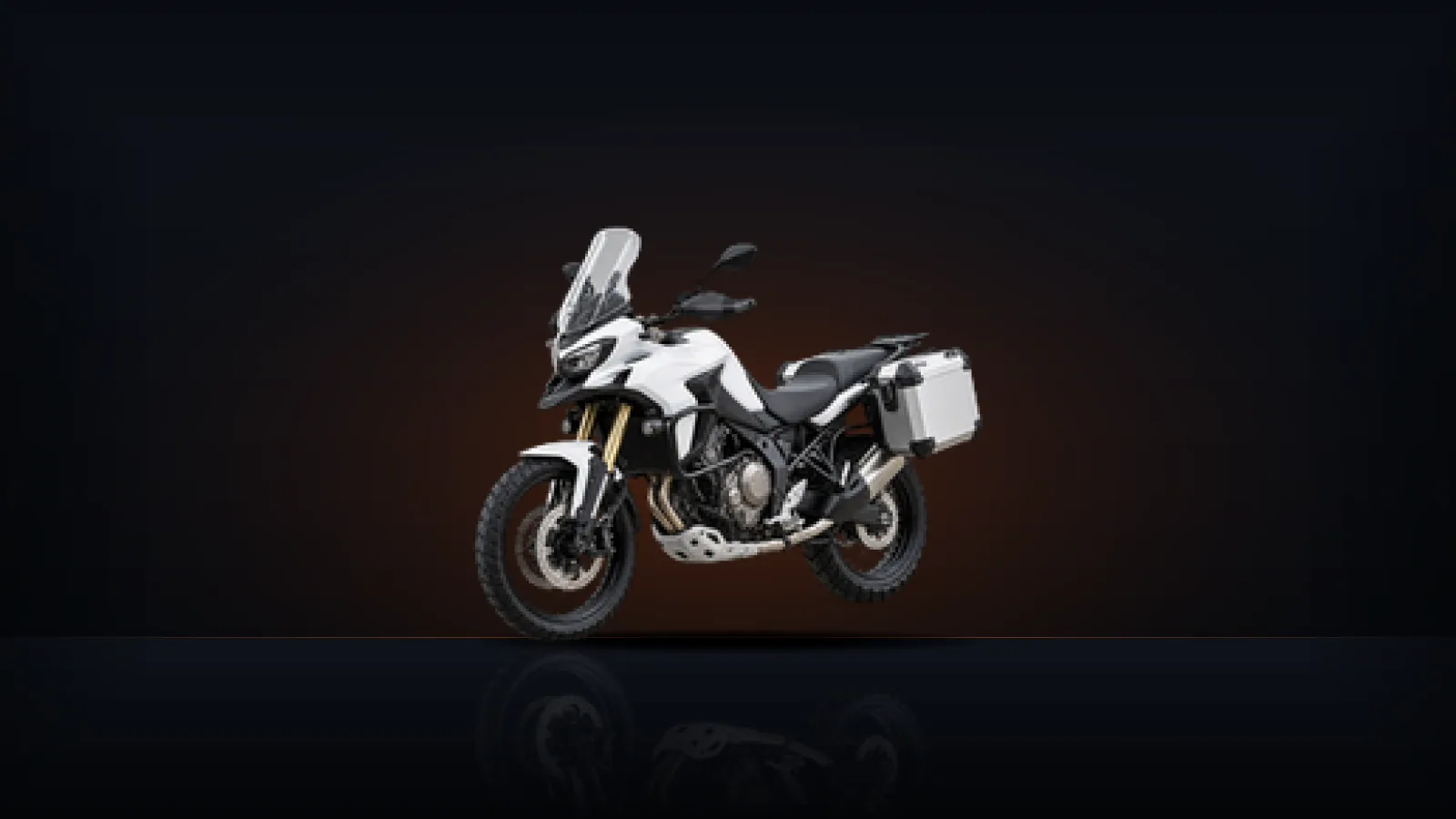 A white adventure motorcycle with an upright, comfortable riding position